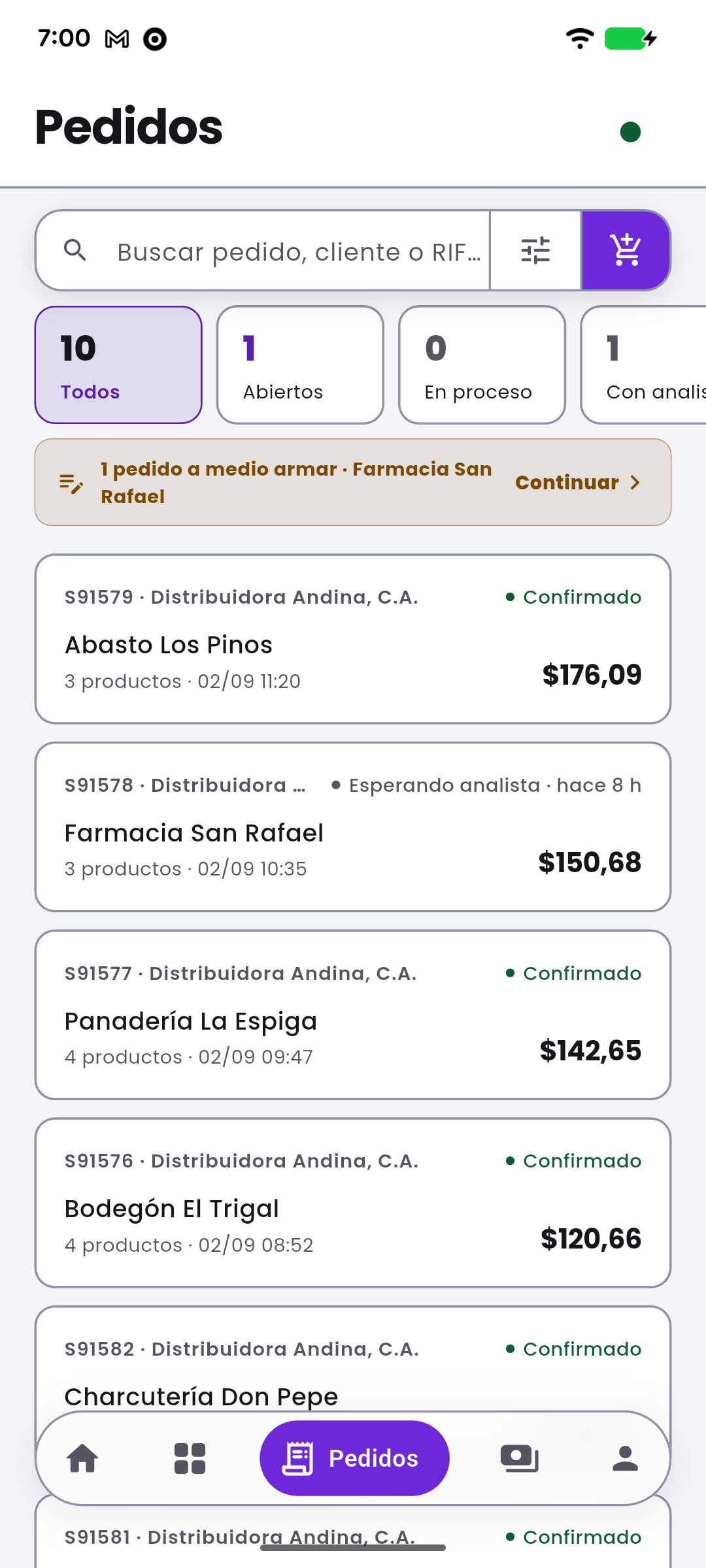 Vendoo order screen: the order lines with their price and stock, and the total in dollars and bolivars.